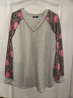 HEIMISH USA Cream V-Neck Top with Pink Leopard Raglan Sleeves
